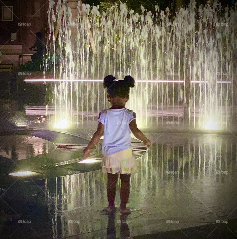 Child at splash pad