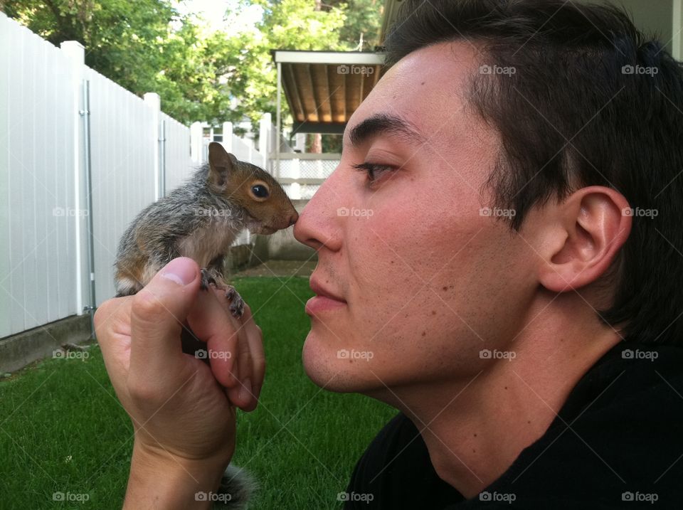 Nose to nose with baby squirrel