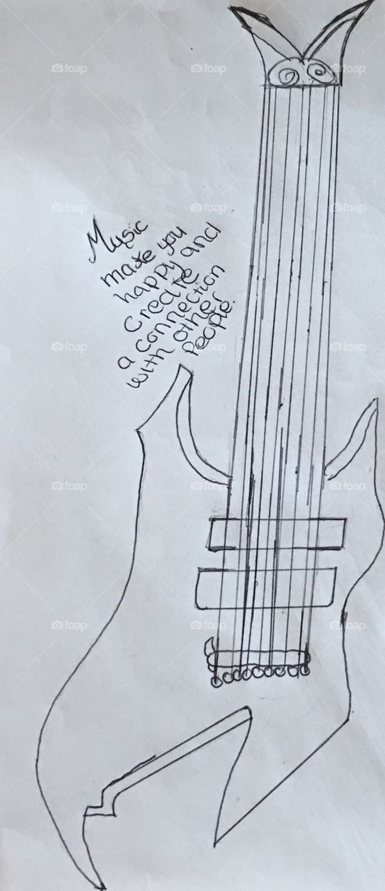 This is a drawing of a guitar and you can color it however you want and has word on it