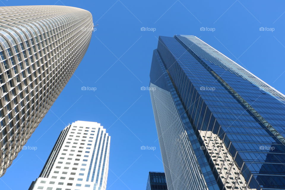 Skyscrapers against blue sky 