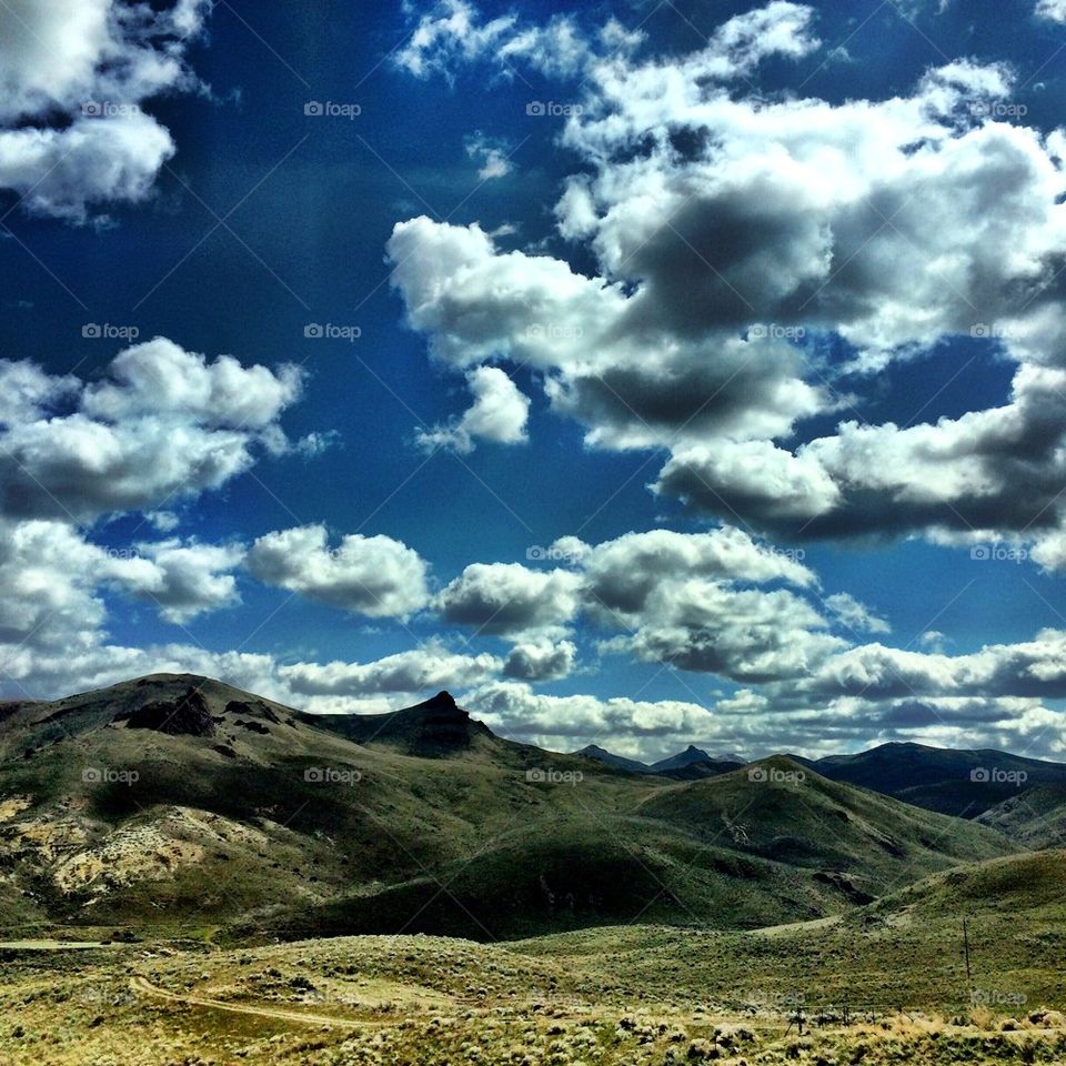 Scenics view of mountain against sky cloud
