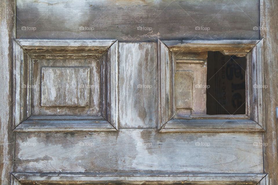 A closeup of a wooden door in  an old rectory building.m in Brooklyn, NewYork City.
