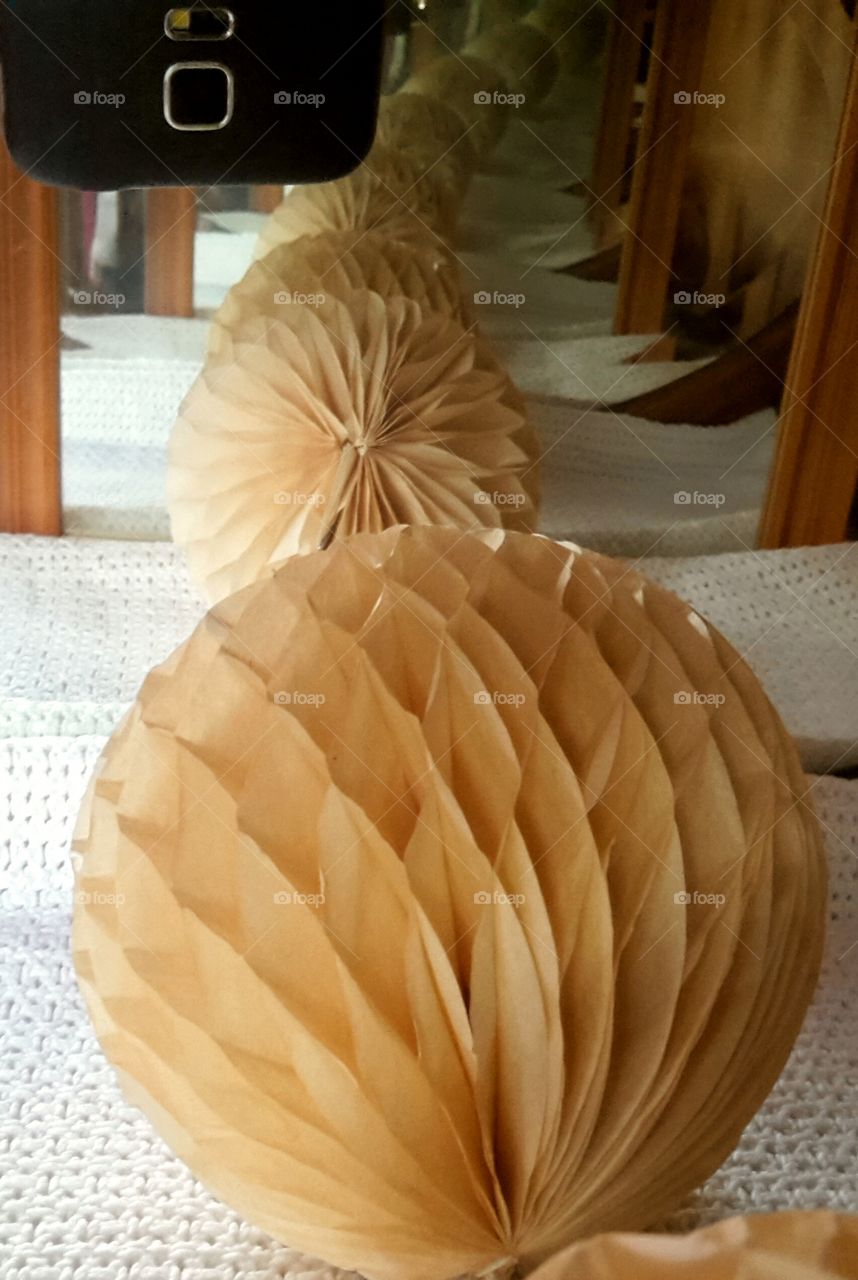 Long row of identical paper balls