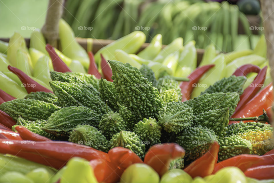 Vegetables in Thailand , Bitter gourd and chilli.