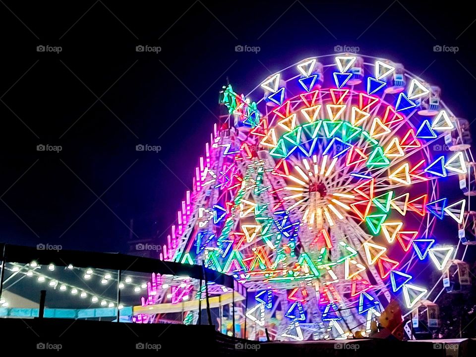 enjoying the ferry wheel ride with friends