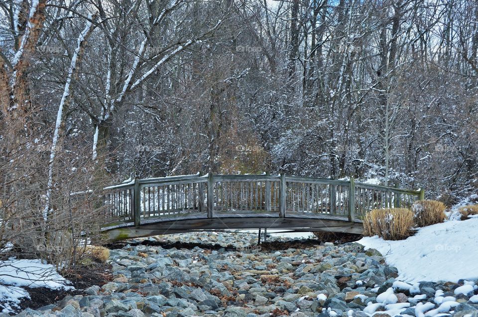 a lonely snowy bridge