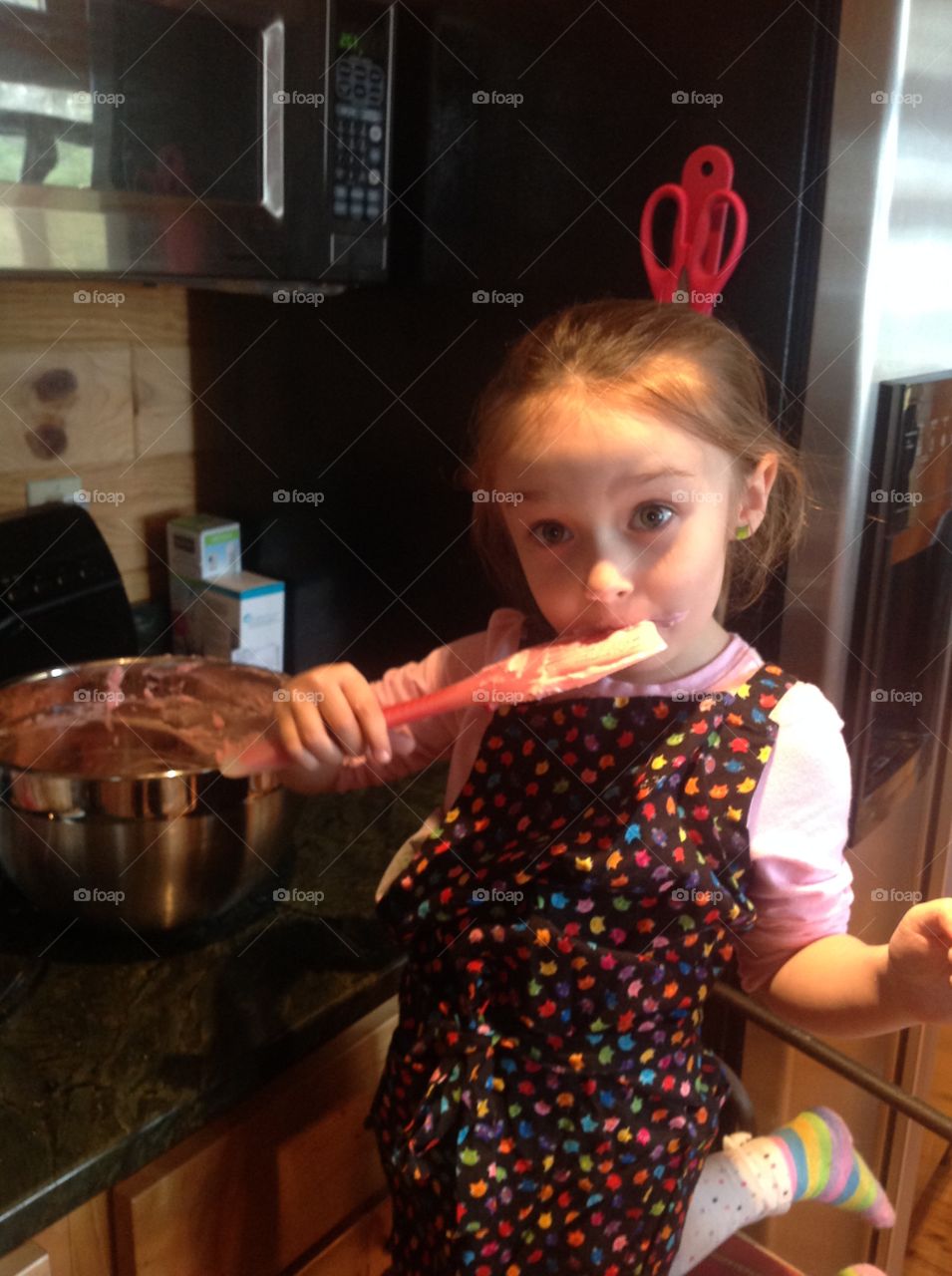 Baking with Grandma. My daughter, baking macaroons with my mom. 