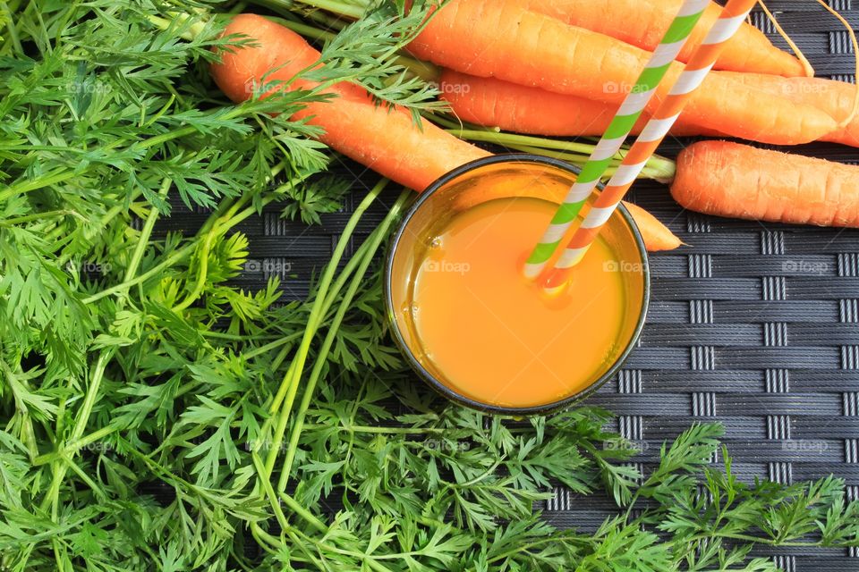 Freshly squeezed carrot juice with organic home grown carrots