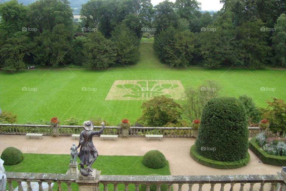 The lush green Powys Castle grounds in Mid Wales