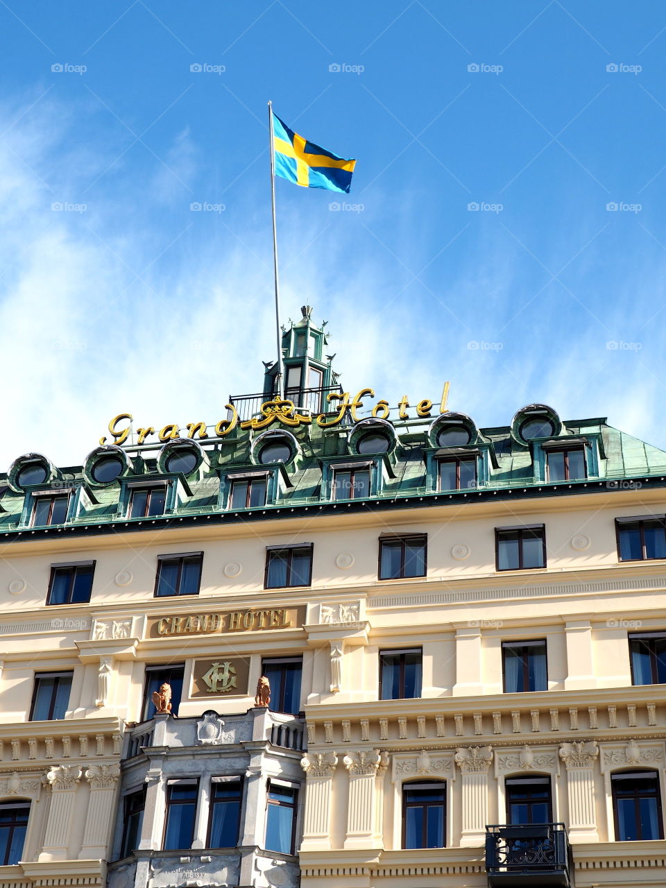 Traditional grand hotel in an old building in Stockholm, Sweden on a bright and warm spring day.