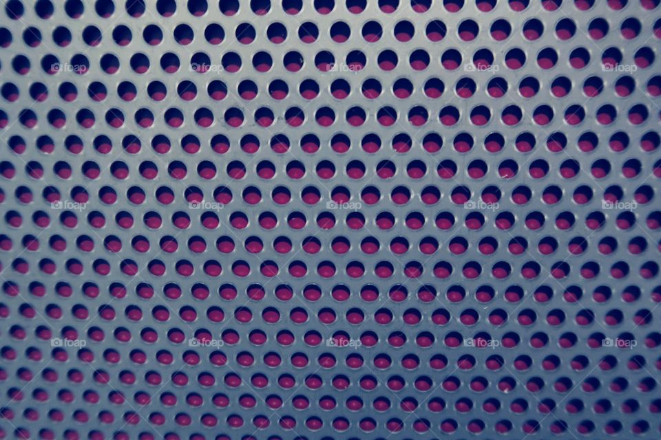 background of grey red metal grid. 