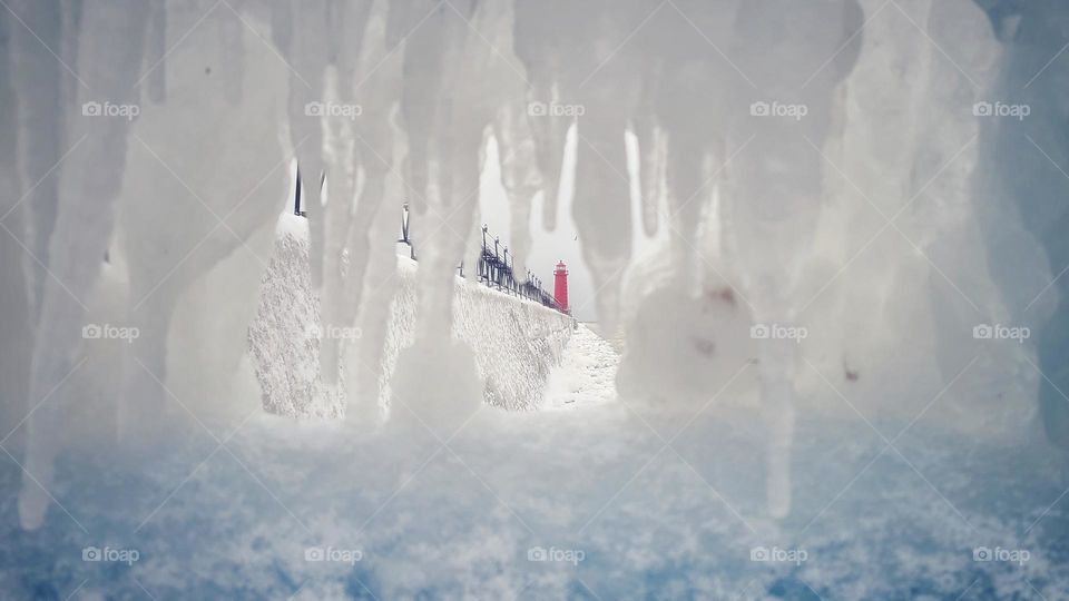 lighthouse through icicles