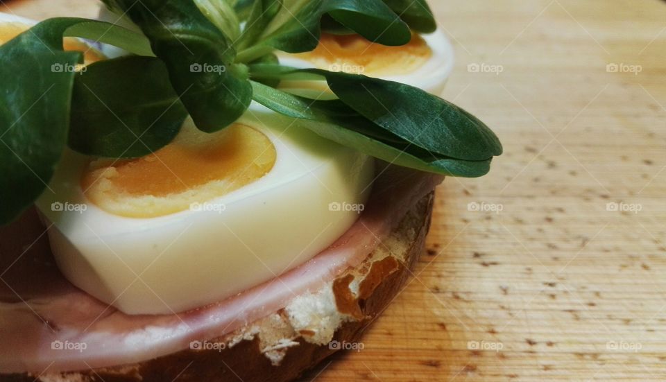 sandwich with ham egg and salad