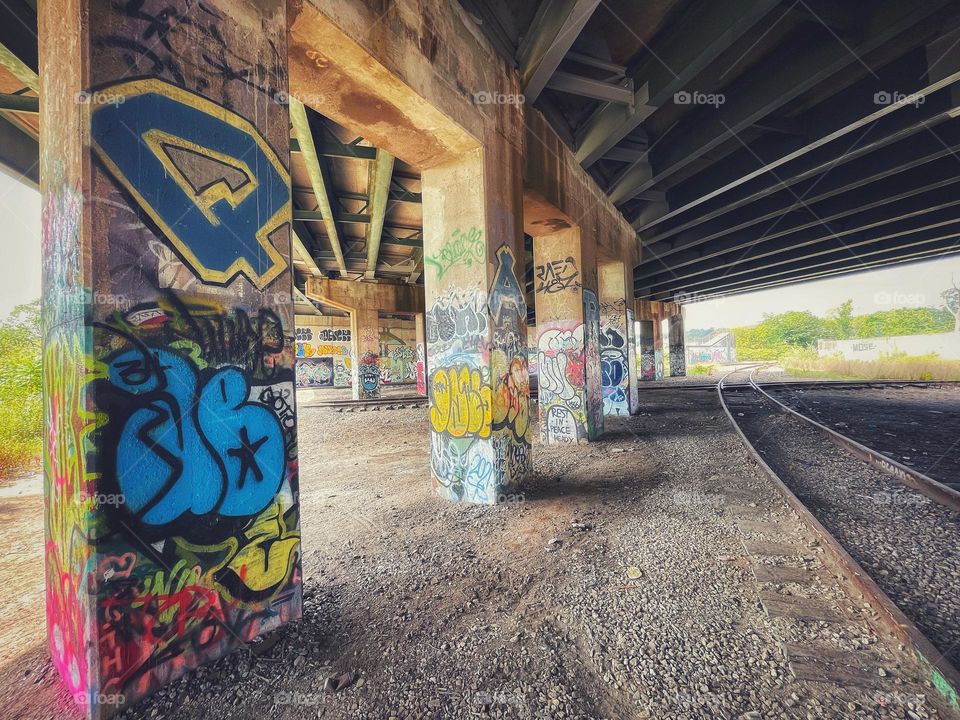 Graffiti beneath the highway 