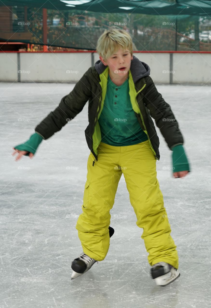 Young Boy Ice Skating