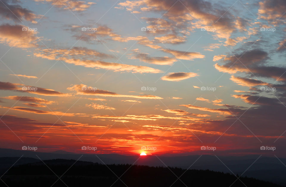 Sunset over the hill