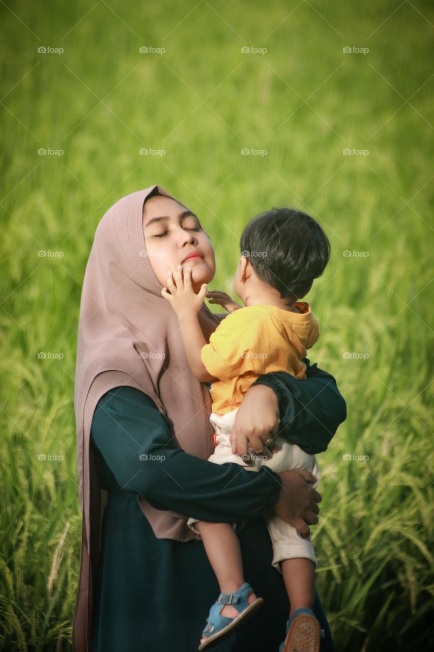 mother's and son in the field
