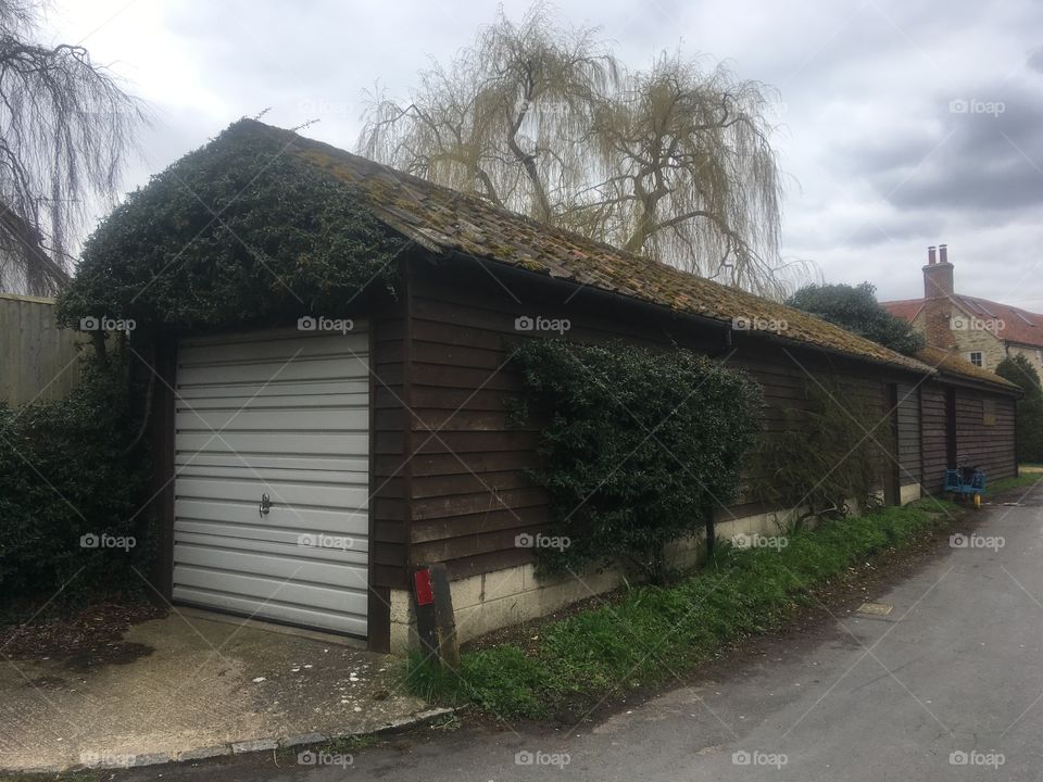 Extra long garage on Bear Lane in Stadhampton, Oxfordshire, in Spring.