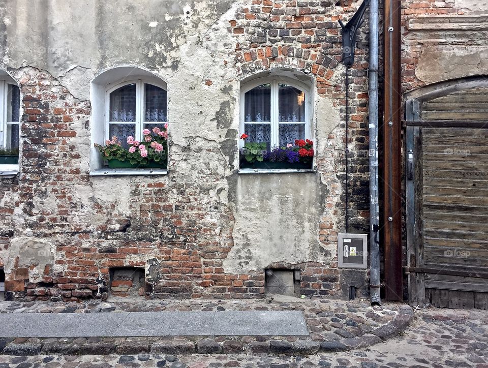 Old facade with sweet windows