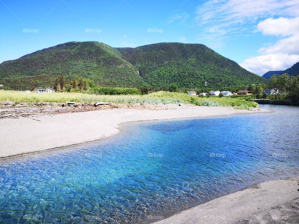 The Marsoui River in the middle of a bucolic landscape. Québec, Canada