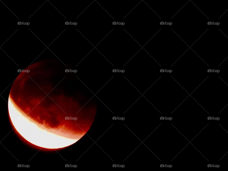 My photos of the Blood Moon, Total lunar eclipse on 15 May 2022 - Lunar eclipses occur when Earth aligns between the sun and the moon and casts a shadow across the lunar surface. The weather condition were very cloudy