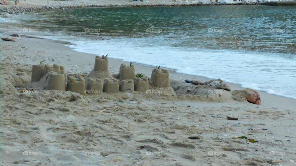 Beach sand castle. Beach sand castle