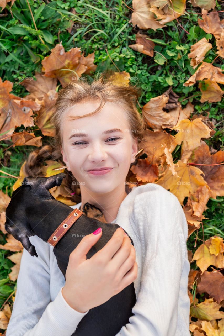 teen and her dog