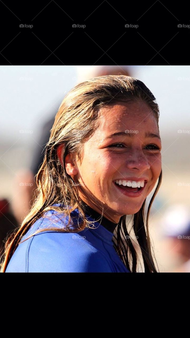 Smiling laughing surf girl