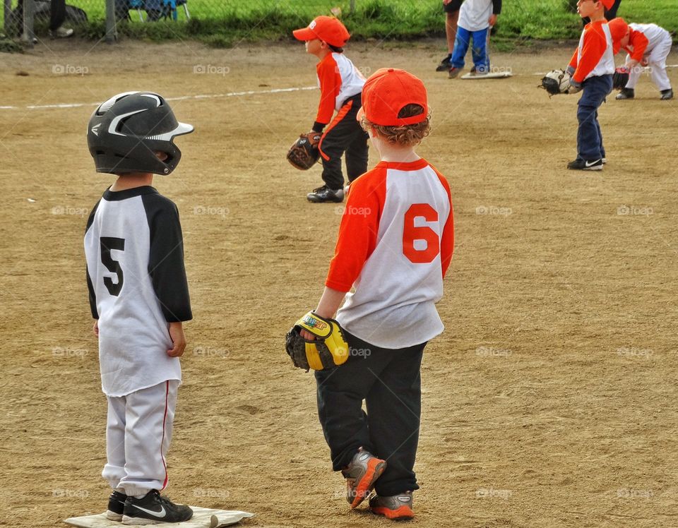 Young Kids Playing Baseball