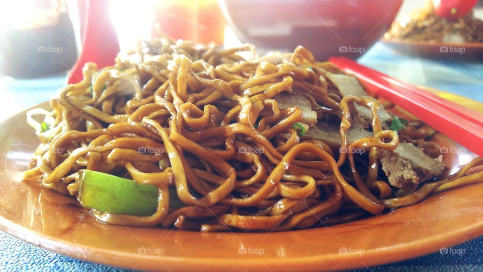 Black noodles are a local favourite in Sitiawan, Malaysia.