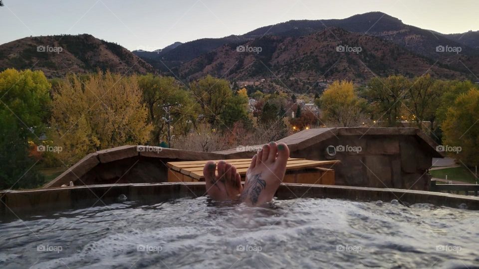 hot tub feet in the mountains