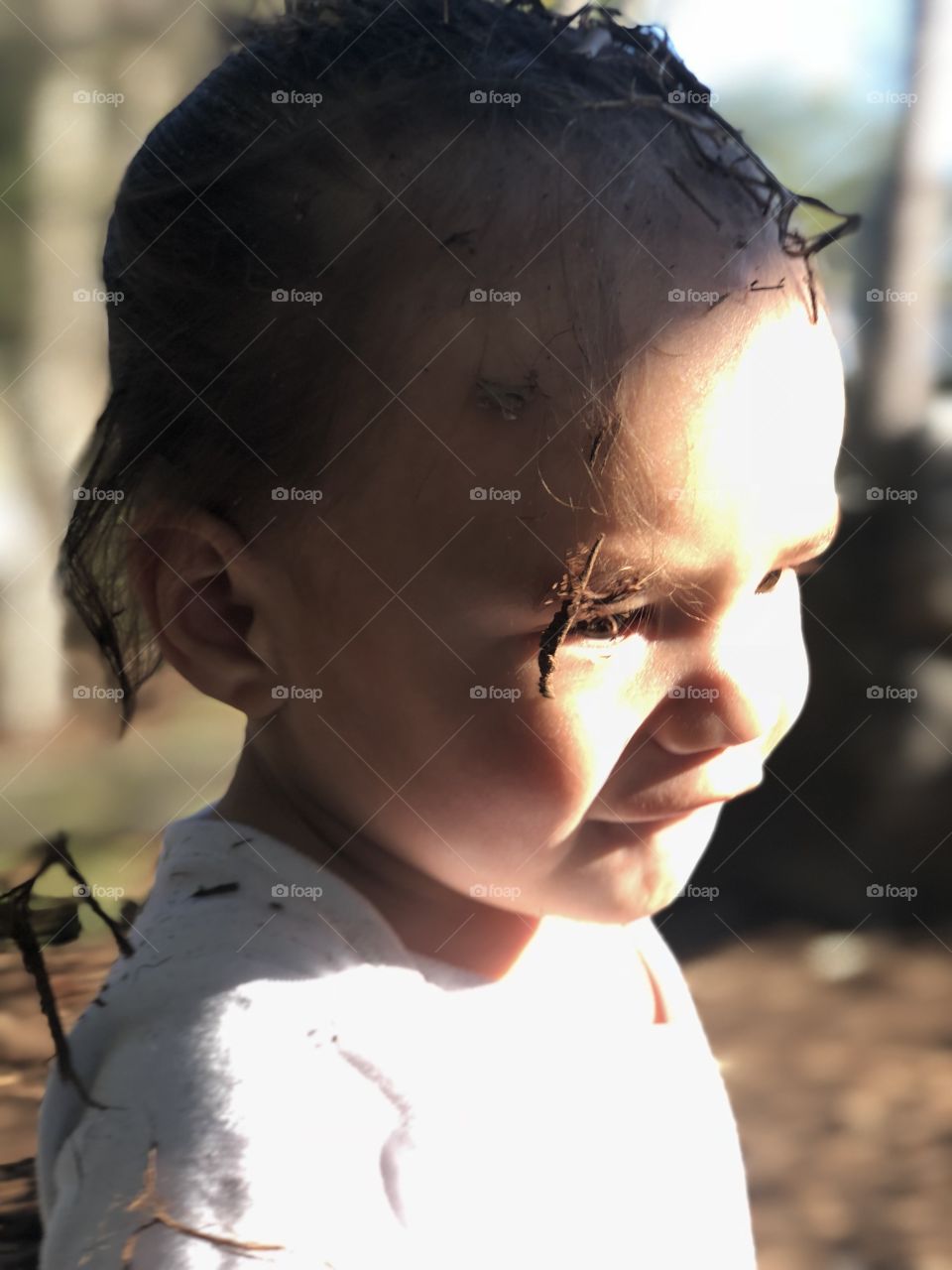 Grandson playing in the bark