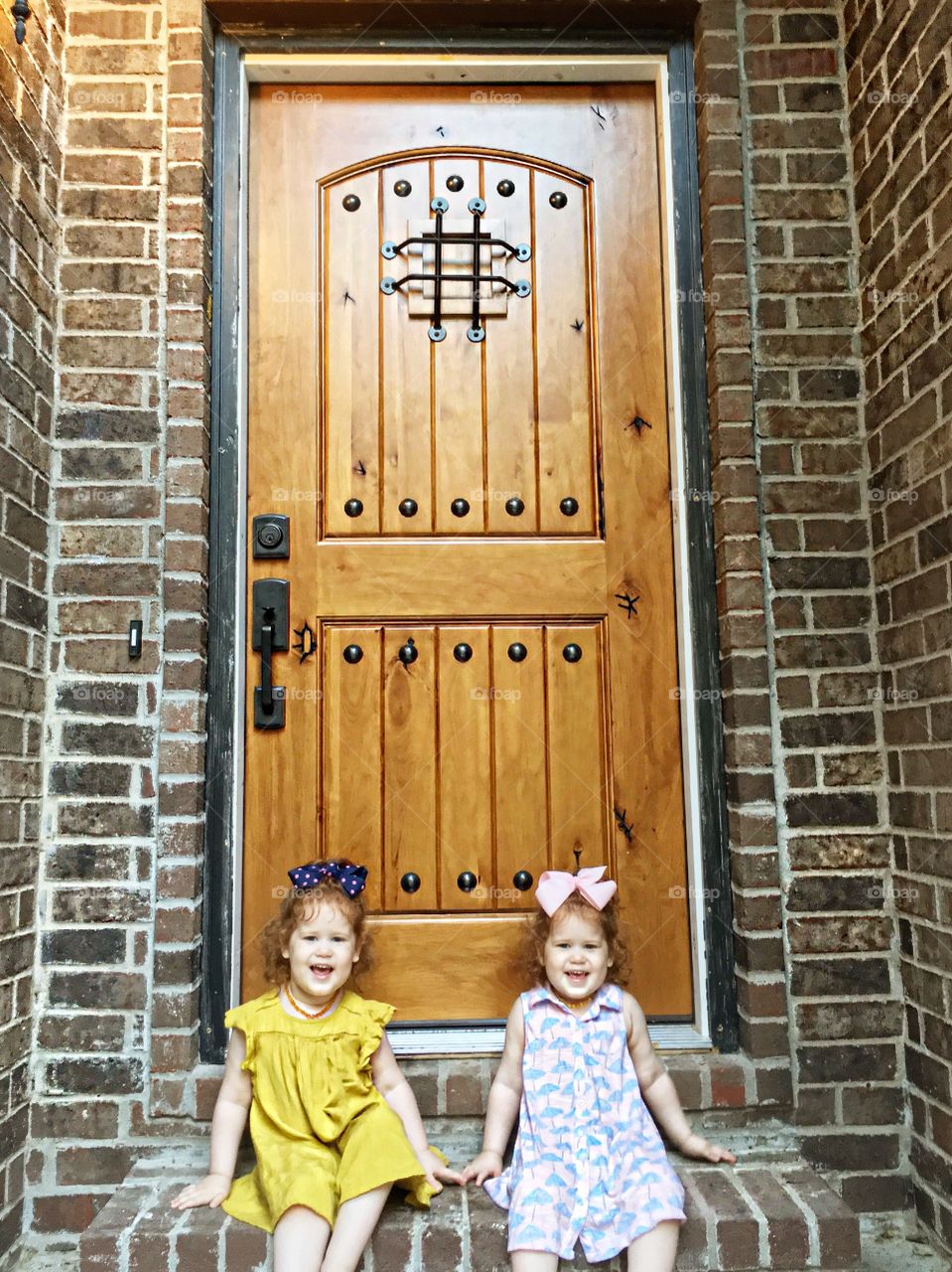 Twins on porch