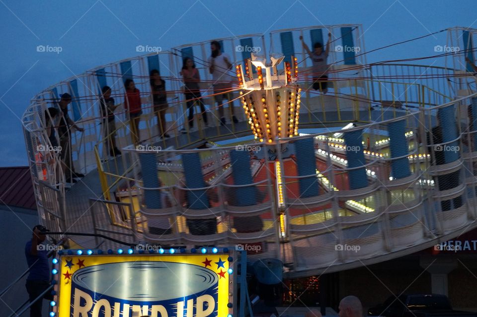 Carnival round-up ride . Night photo