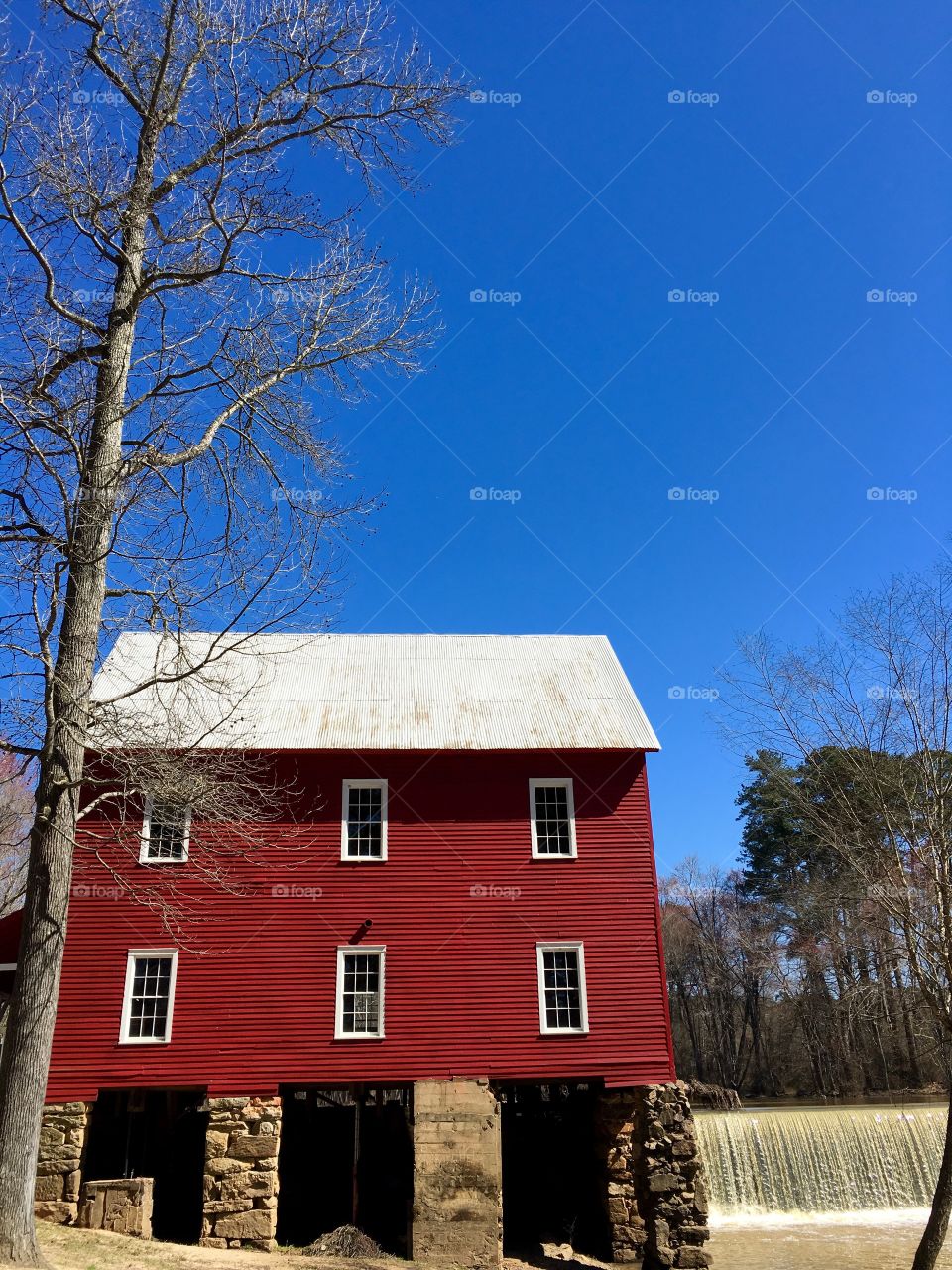 Red mill and waterfall