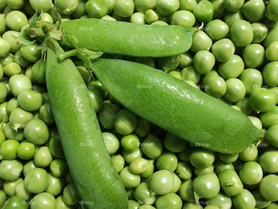 Delicious green peas background