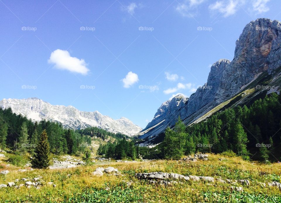 Landscape of mountains . Landscape of mountains, beautiful nature in summer time, face of woman look on rocky mountain surface.