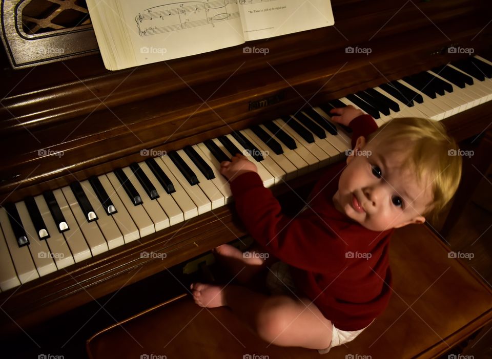 Mastering the piano at an early age 
