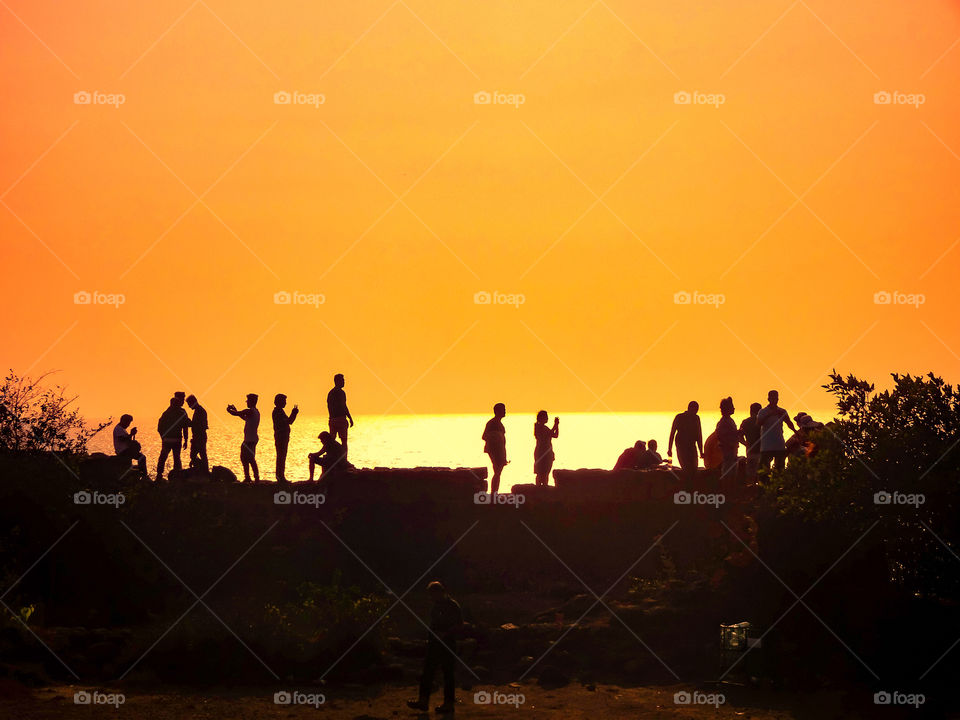 human silhouettes enjoying evening at sunset...🙂