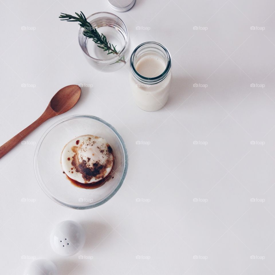 Delicious food with jar of milk on with background