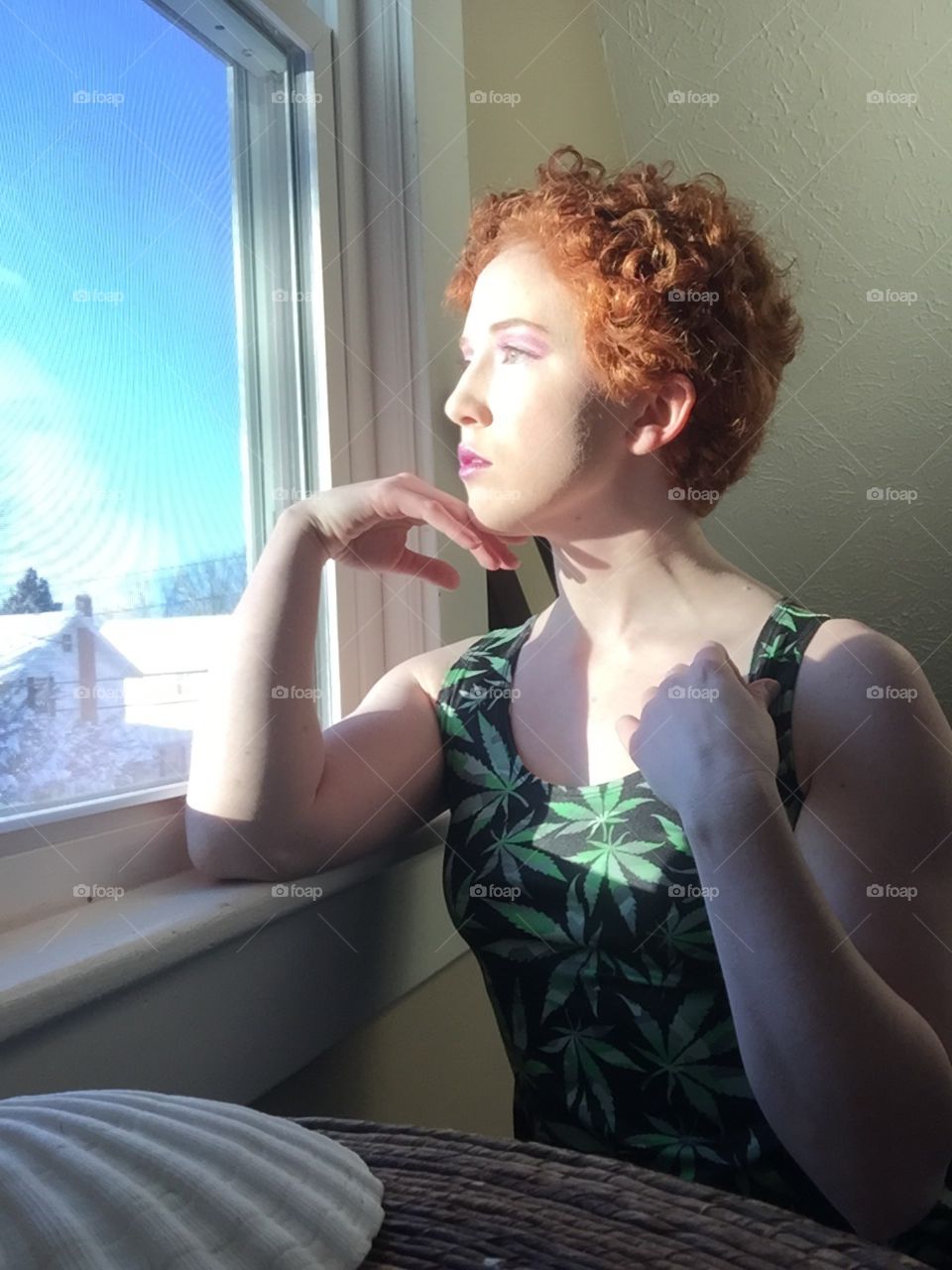 Natural redhead in sunset window 
