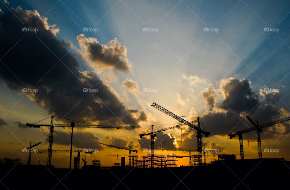 construction sunset clouds building by chrisc