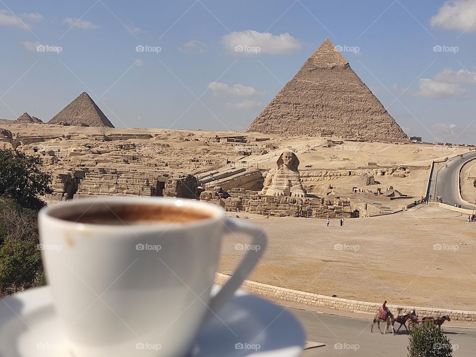 a great day in Great Giza Pyramids morning drinks coffee & and Egyptian tea with mint 
this is Egyp