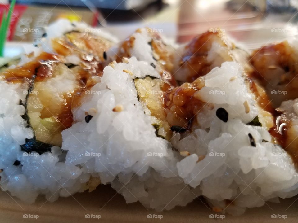 Extreme close-up of tempura shrimp sushi