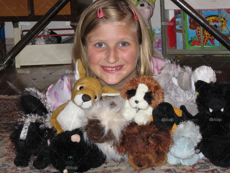 Girl with her stuffies
