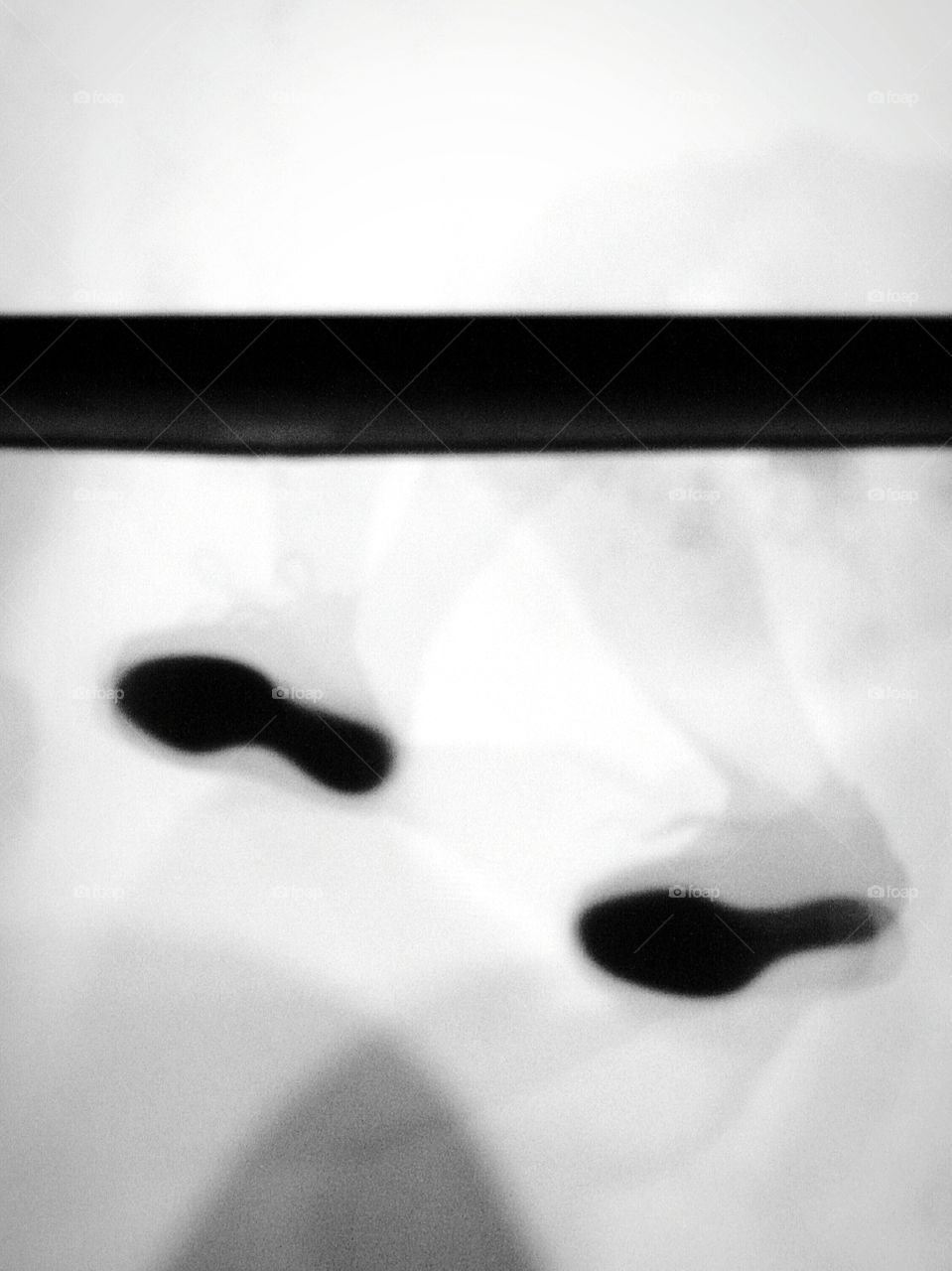 silhouette footsteps in black and white