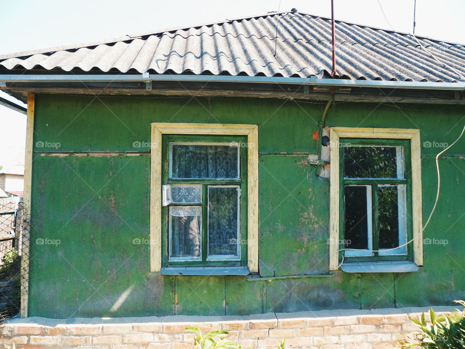 Wall with two windows rural home