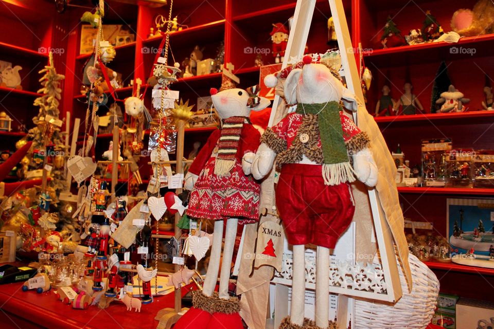 Happy New Year and Merry Christmas. Christmas decorations. Fir branches, shiny balls, garlands, lights and lanterns. gingerbread, dried fruits, nuts. Preparing for Christmas at home and on the streets.