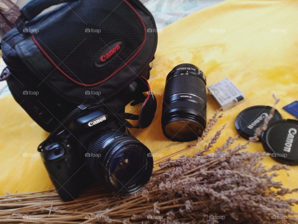 Camera in photography is a device for recording an image of an object on a light-sensitive surface, it is essentially a light-tight box with an aperture to admit light focused onto a sensitized film or plate.