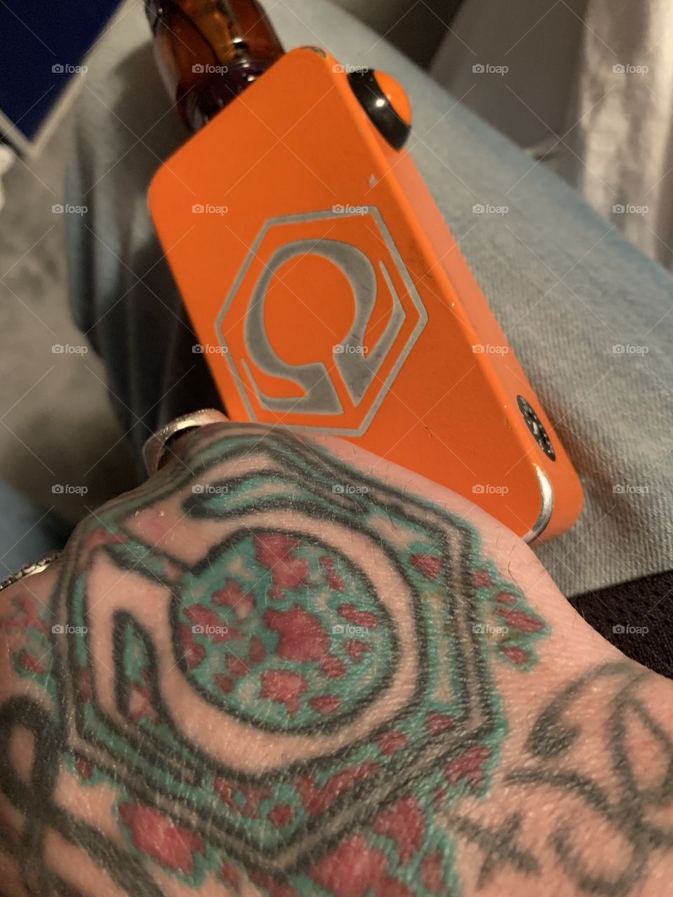 Showing my matching vape mod and hand tattoo. Been vaping for six years now helped me quit smoking from a pack a day. This is a hexohm one of the best mods out there. 